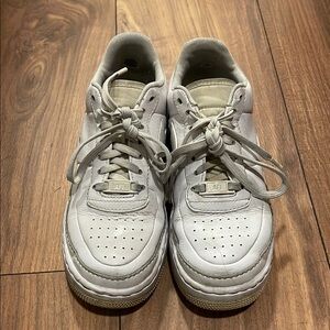 Nike White Sneakers with Leather Upper and Ventilated Design